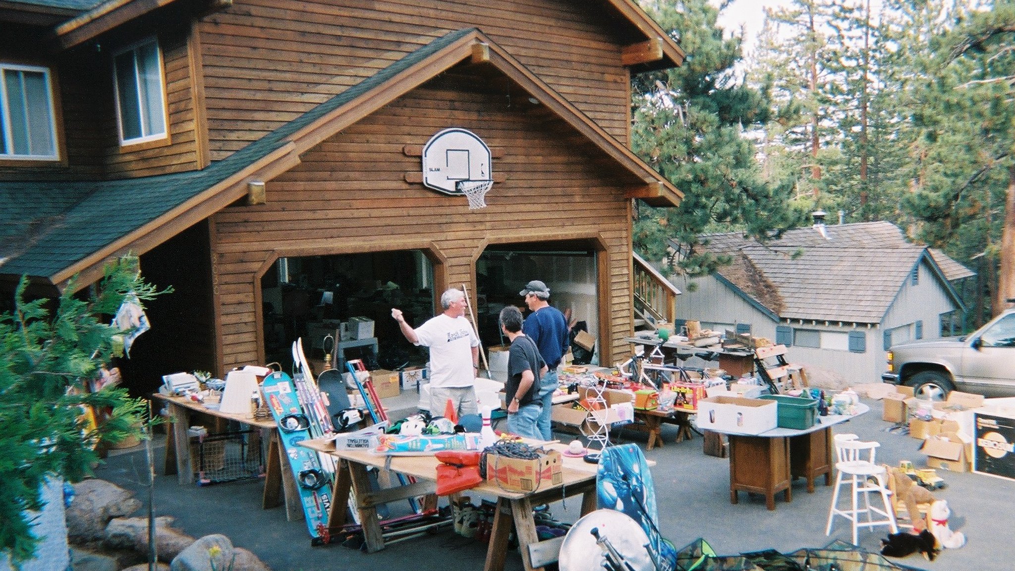 Colorful yard sale with items displayed on tables